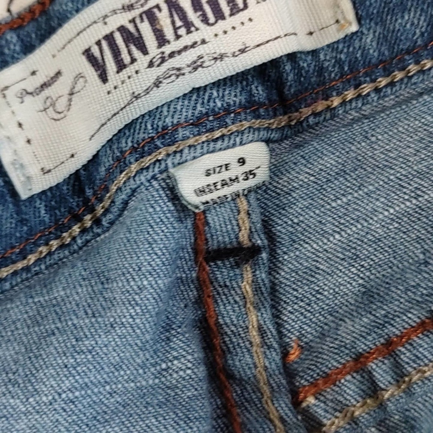 Vintage Long Distressed High-Rise Jeans